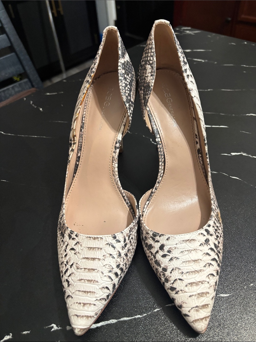 BCBGeneration Cream and Black Snake-Print Pointed Pumps